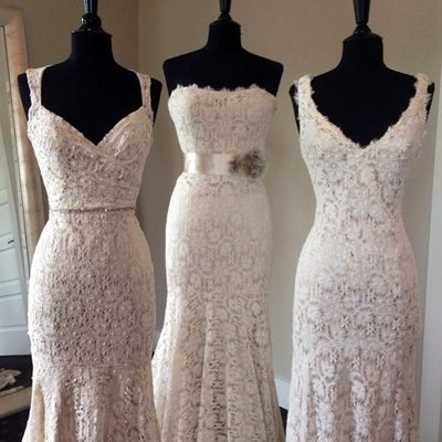 three wedding dresses on manikins
