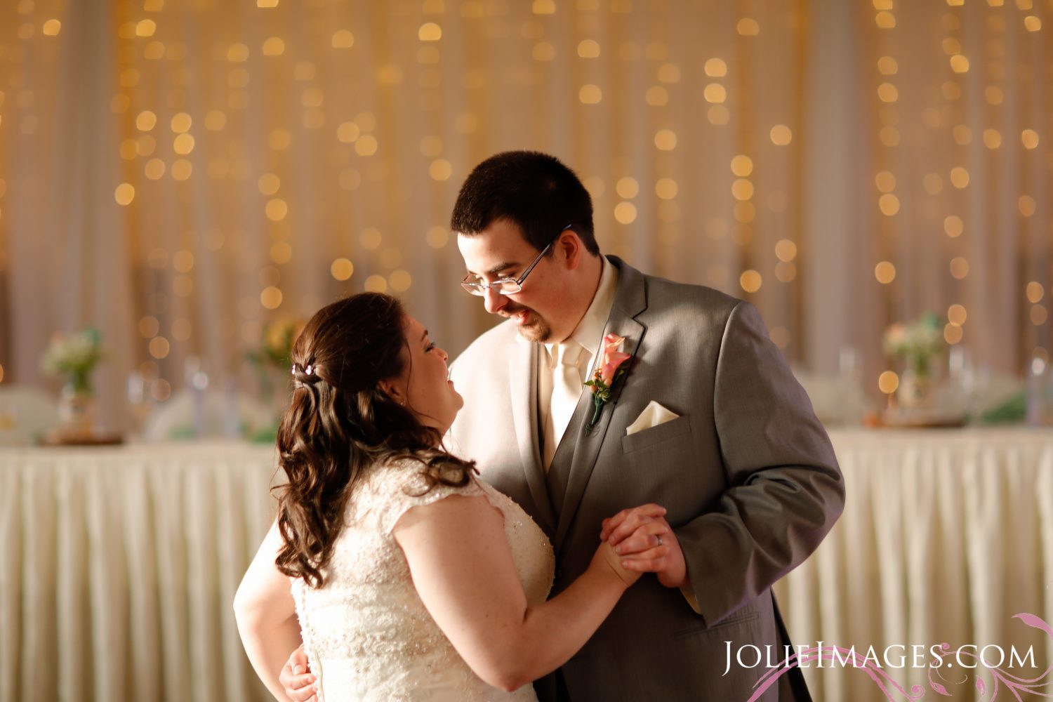 bride and groom dancing