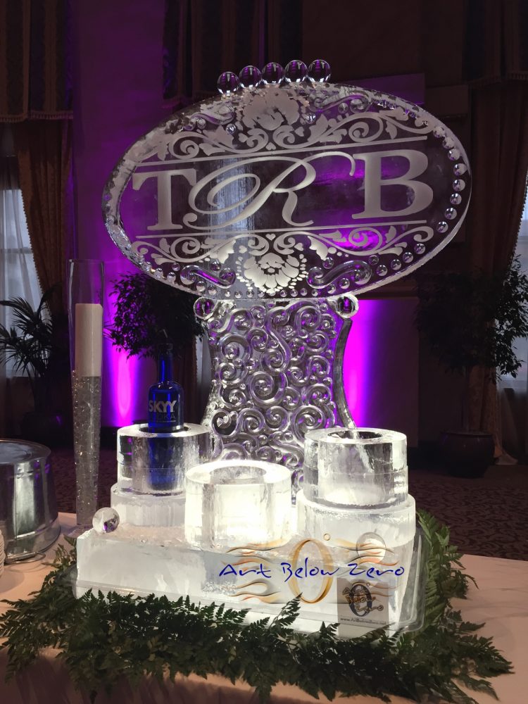 Monogram with Damasque Ornaments and vodka holders ice sculpture