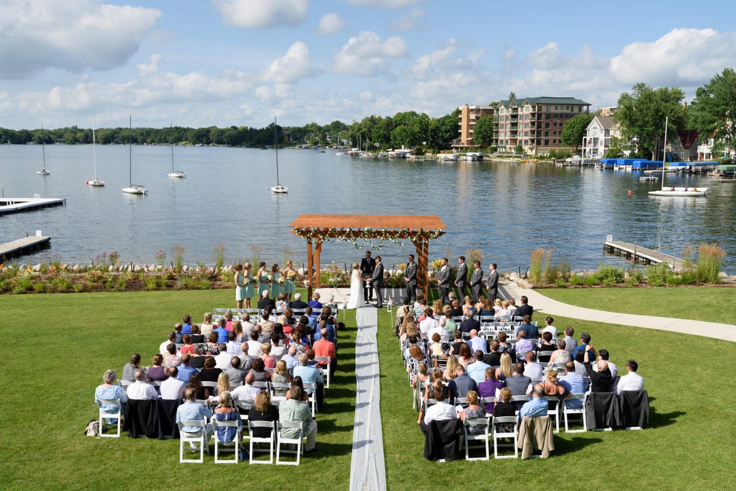 Outside Wedding ceremony at the Oconomowoc Community Center overlook Lac la Belle