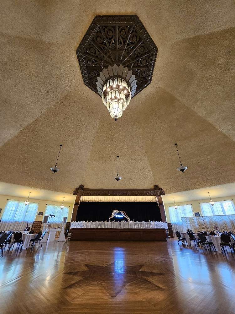 The Chandelier Ballroom in Hartford is a wedding and event space with large ceiling with a beautiful chandelier focal point.