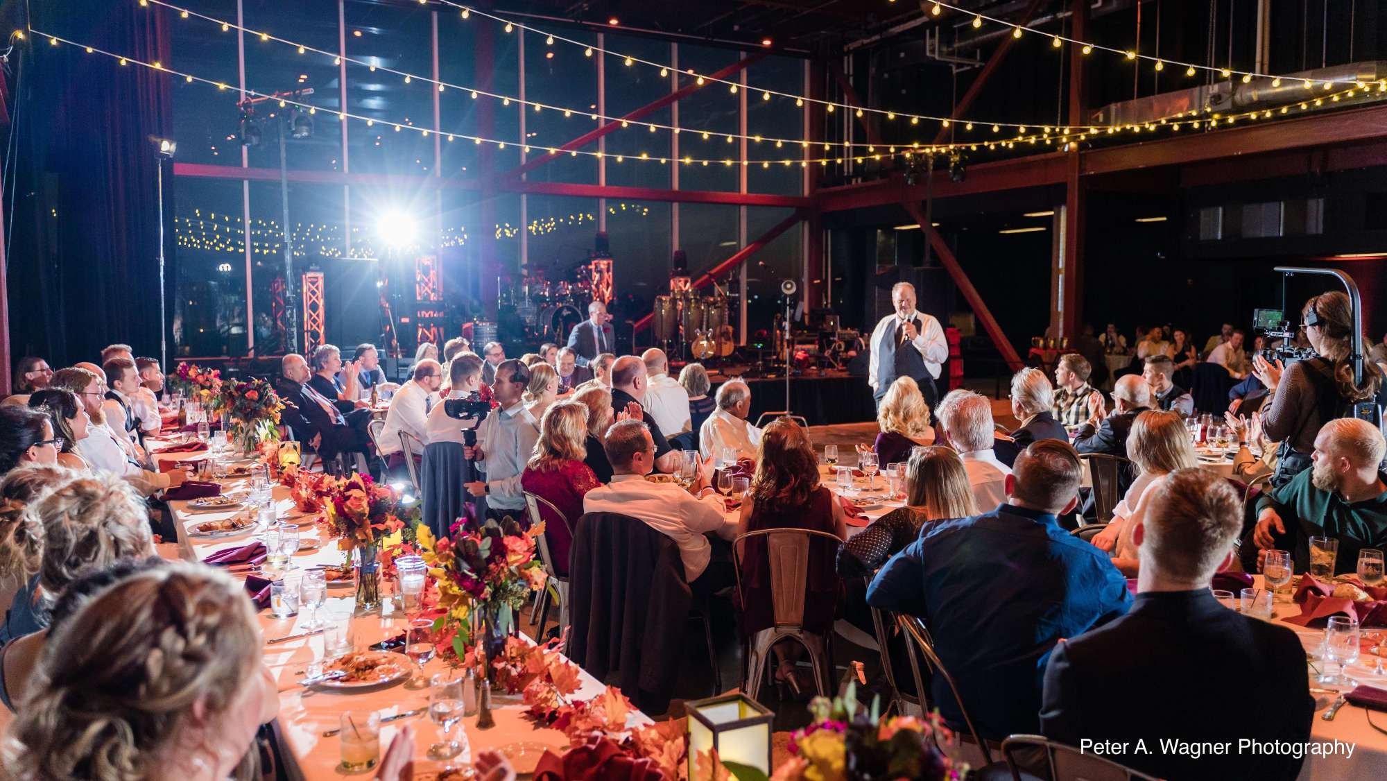 Claire and Nick embrace with a gorgeous city view as the backdrop at Jan Serr Studio.