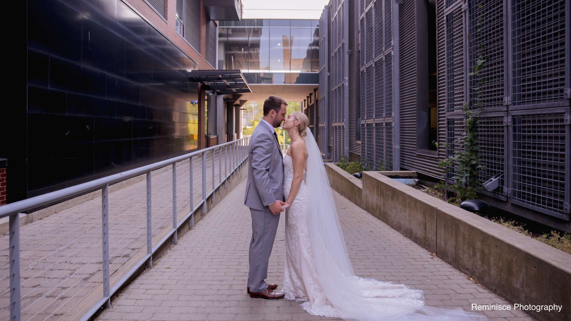 Brian and Emma share a romantic moment in the elegant space of Jan Serr Studio.