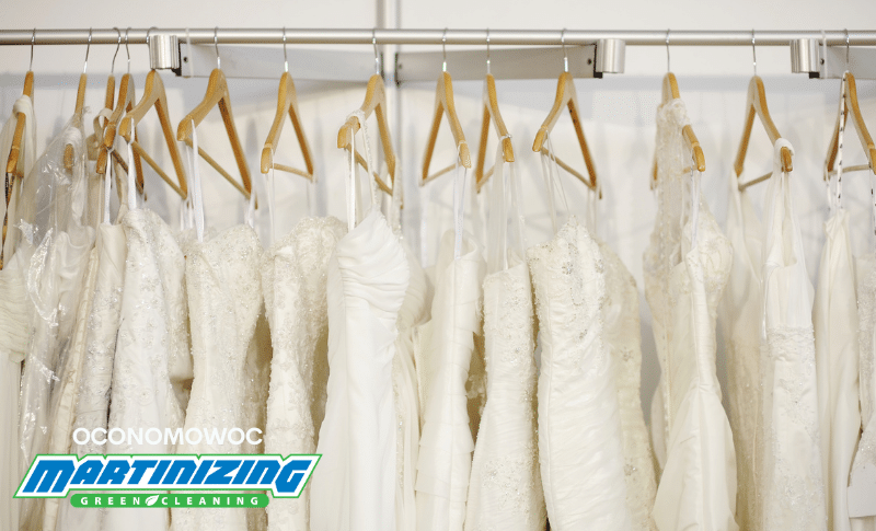 Oconomowoc Rack of white wedding gowns
