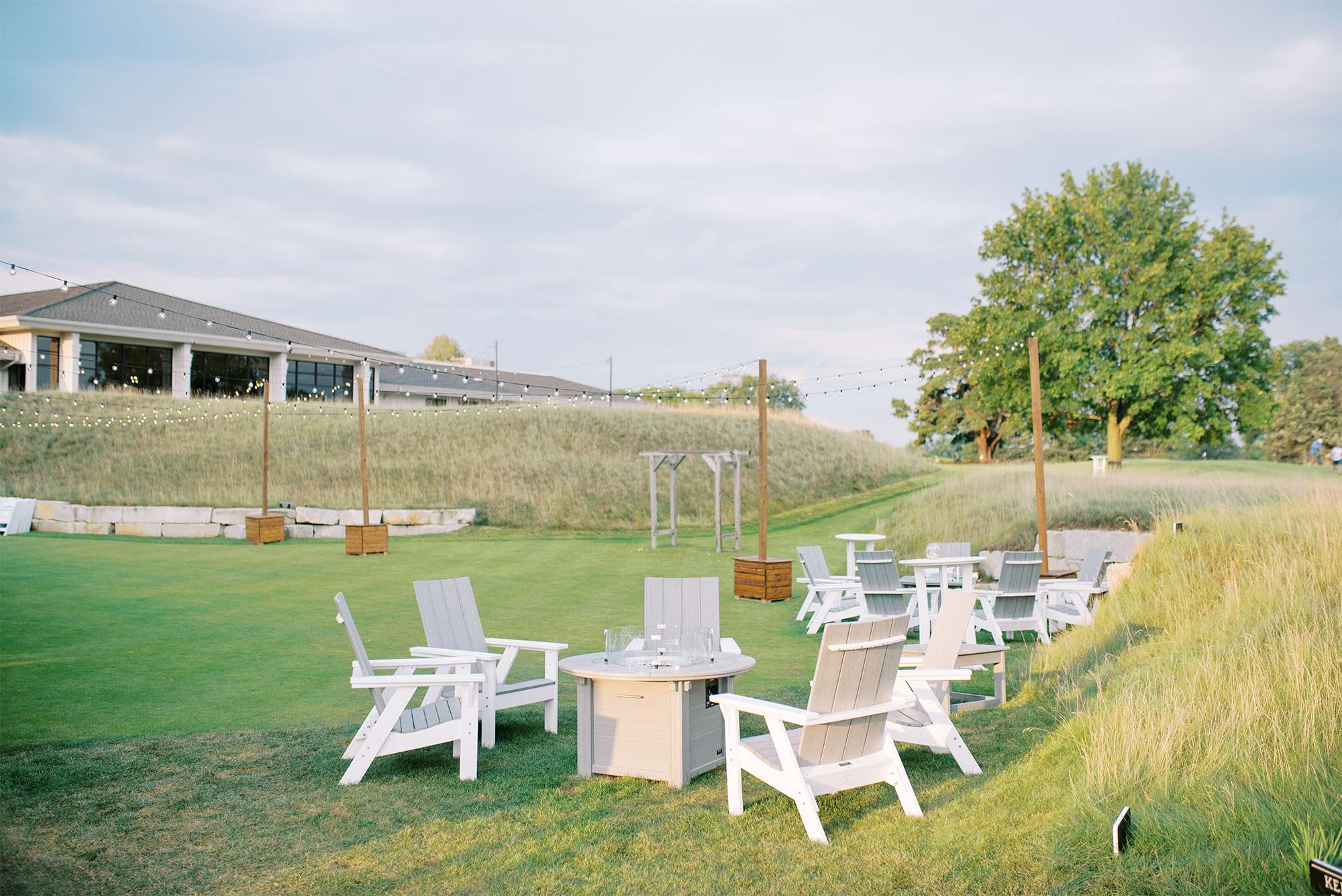 The Carriage House at the Club at Lac La Belle outdoor area all set for a wedding.