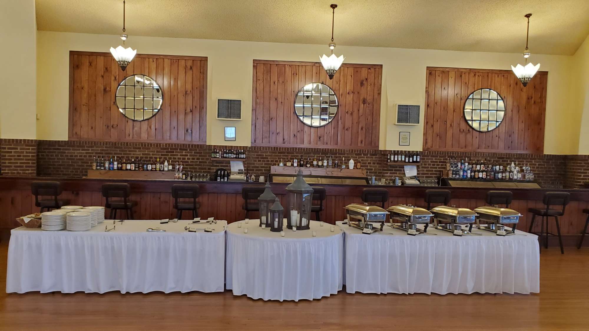 Wedding buffet set up in front of the bar area at the Chandelier Ballroom in Hartford, WI.