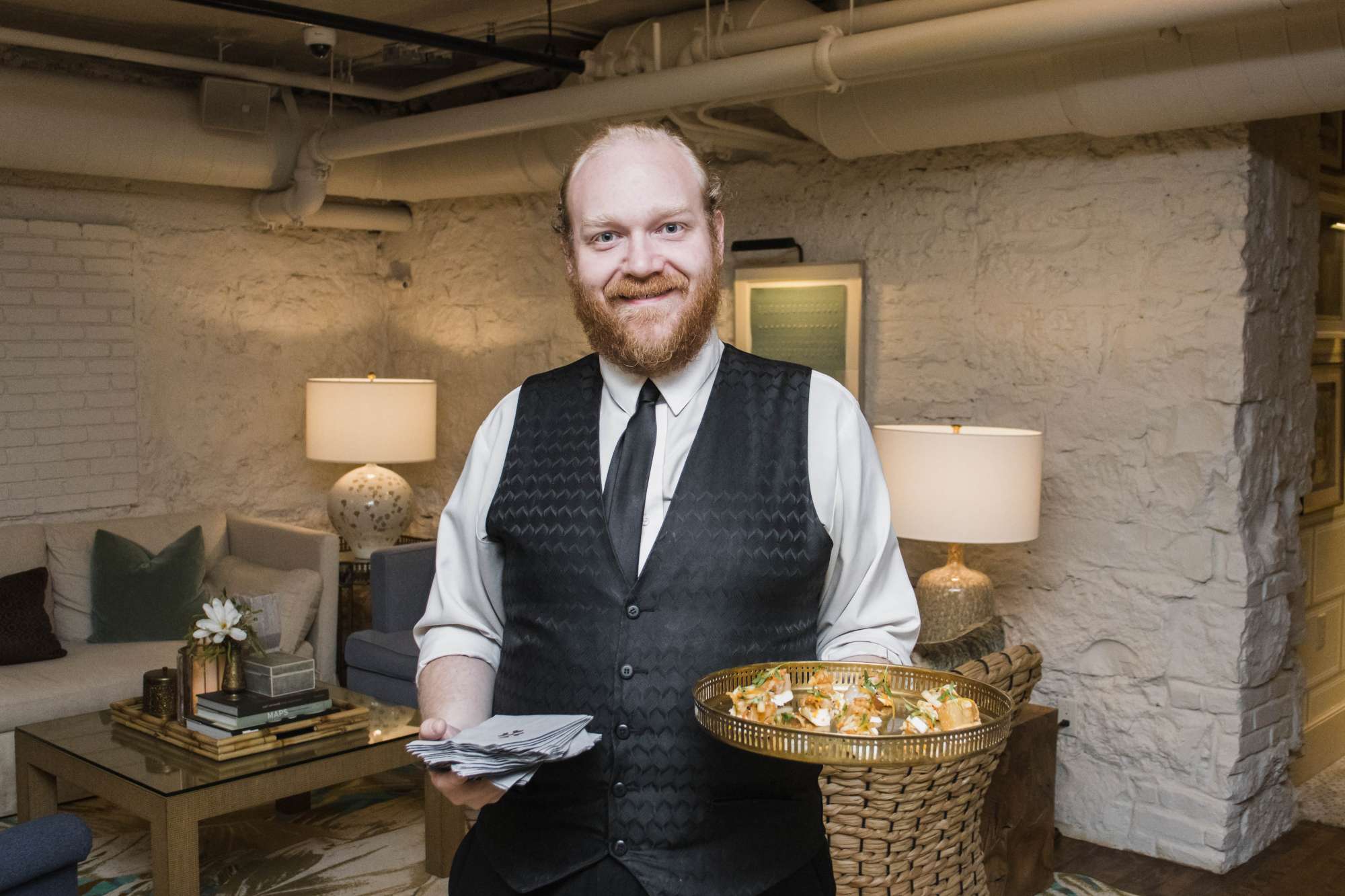 Elegant black tie service for passed hors d'oeurves at your next catered event