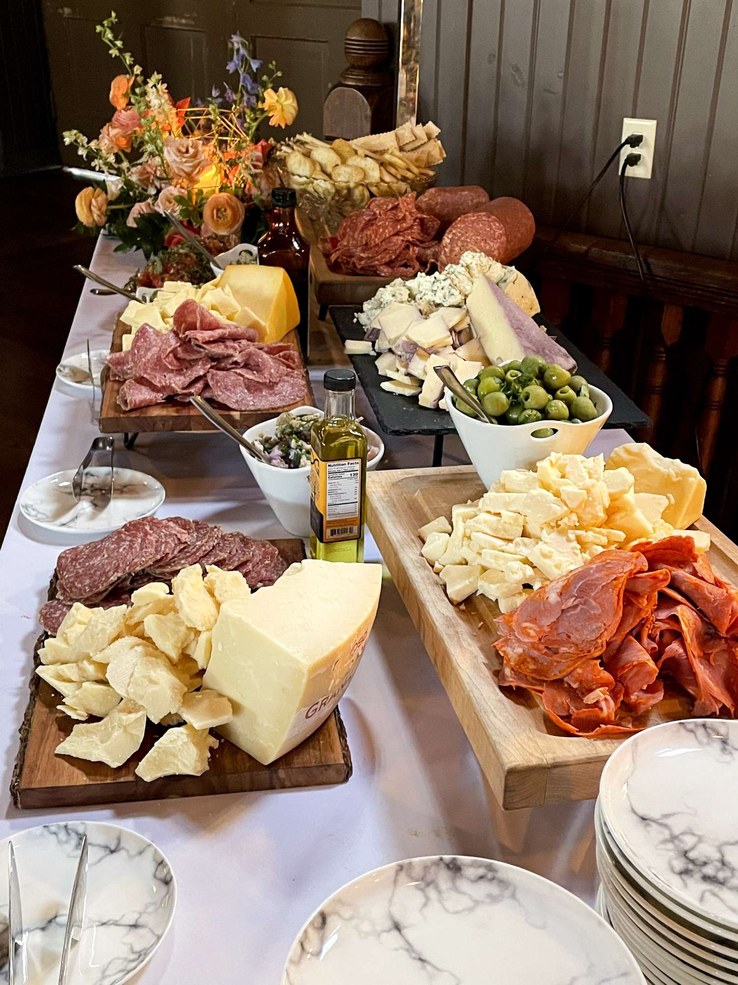 cheese and sausage chacuterie table by noble cateringa and events in milawukee