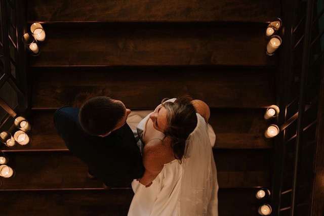 Bride and groom on staircase at The Gage in Milwaukee, WI