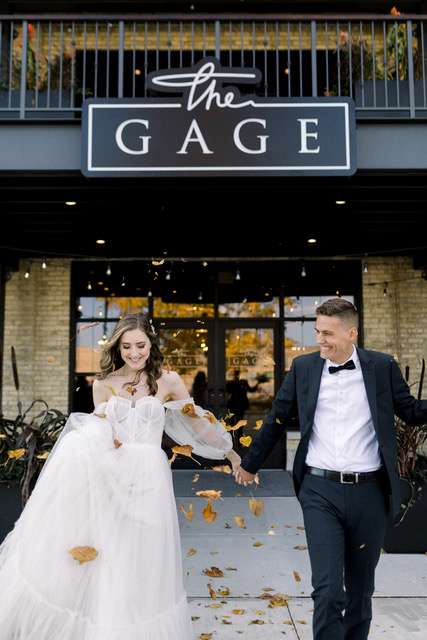 Bride and groom outside of the Gage in Milwaukee