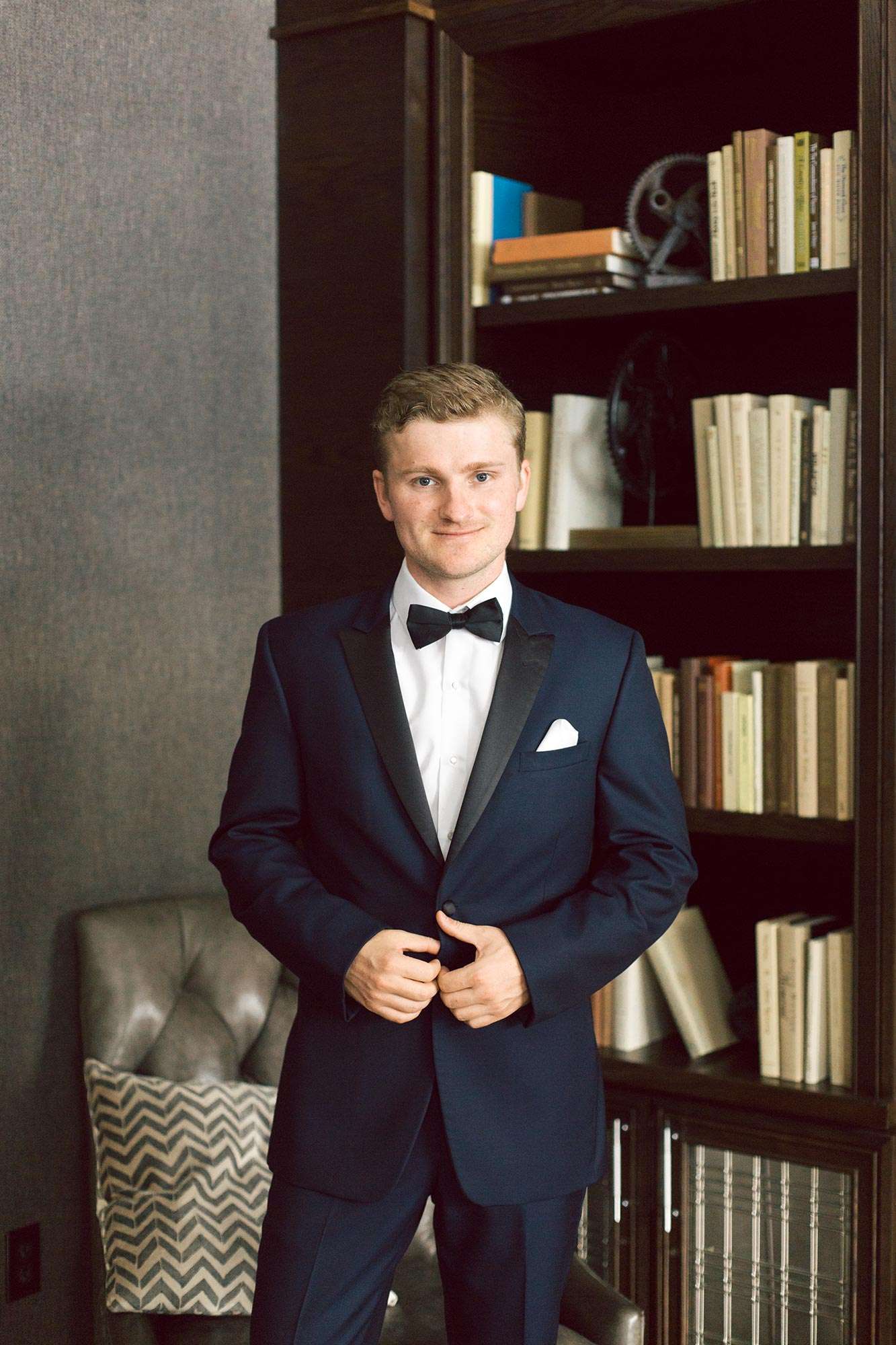 Daniel buttoning his tux from DuBois Formalwear Daniel buttoning his tux from DuBois Formalwear