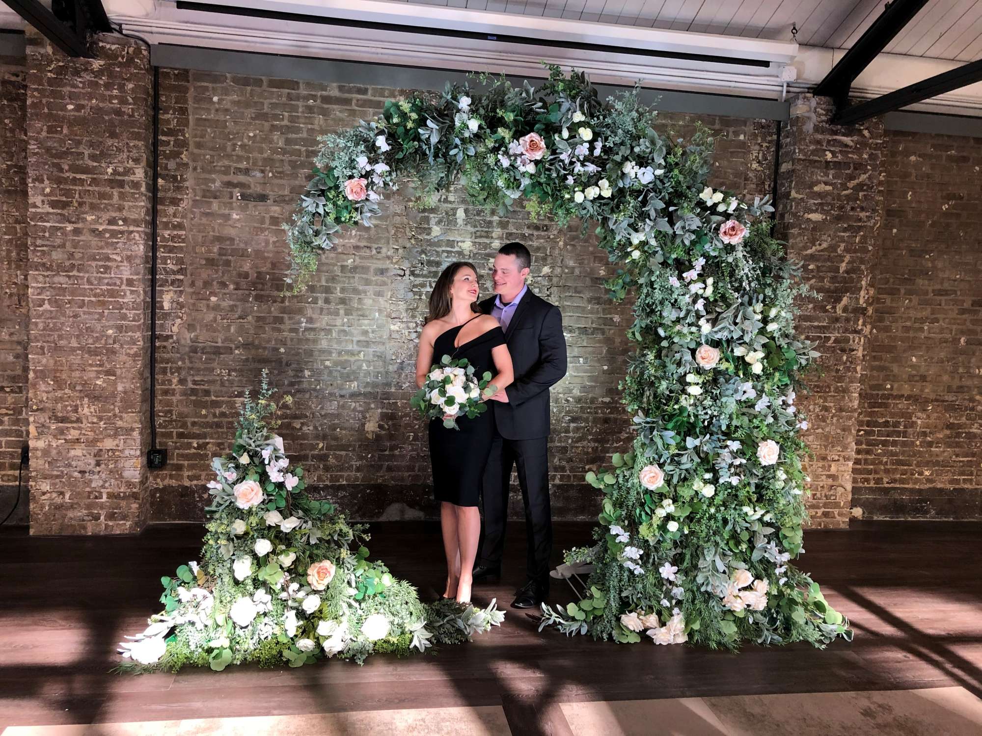 Circular arch drenched in fresh flowers- Arch by Exciting Events