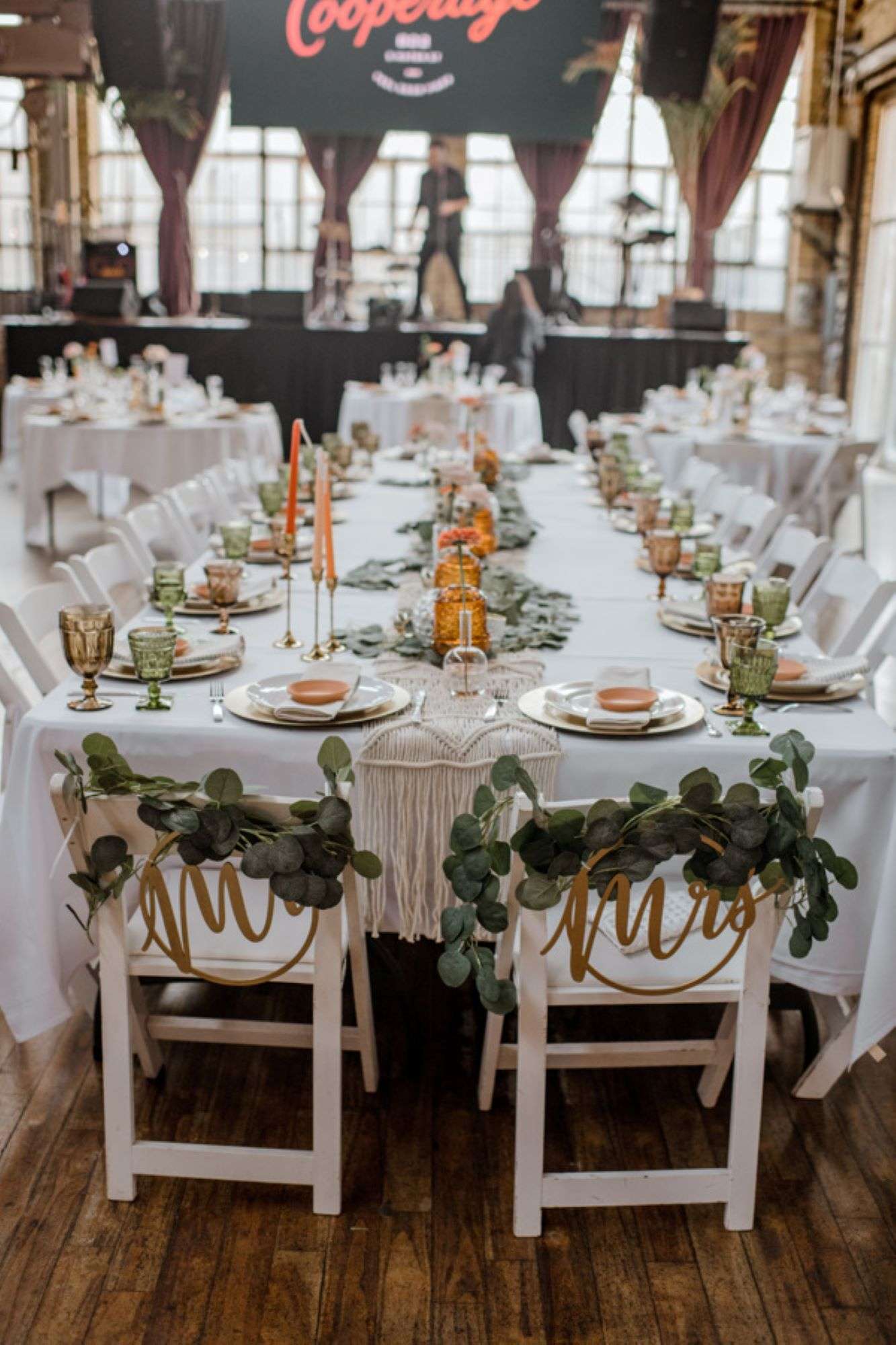 Bride and groom chairs are a perfect touch to the head table.