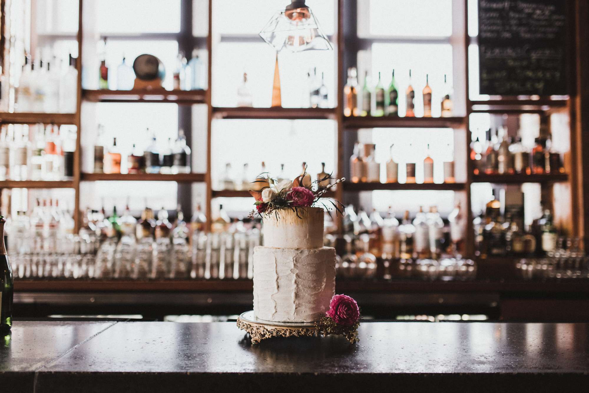 Iron-Horse-Hotel-Cake-on-Branded-Bar.-Roost-Photography