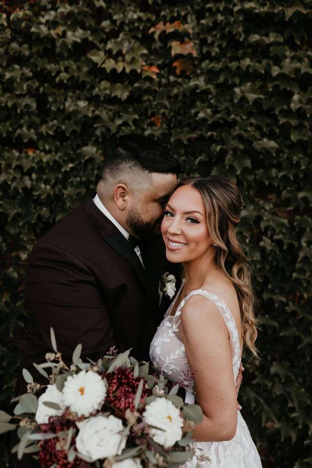 Bride and groom . Brides wears gown from Bon Bon Belle Bridal in Burlington, WI