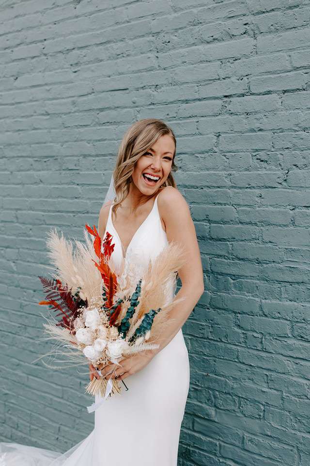 A Bon Bon Belle Bridal bride with bouquet.