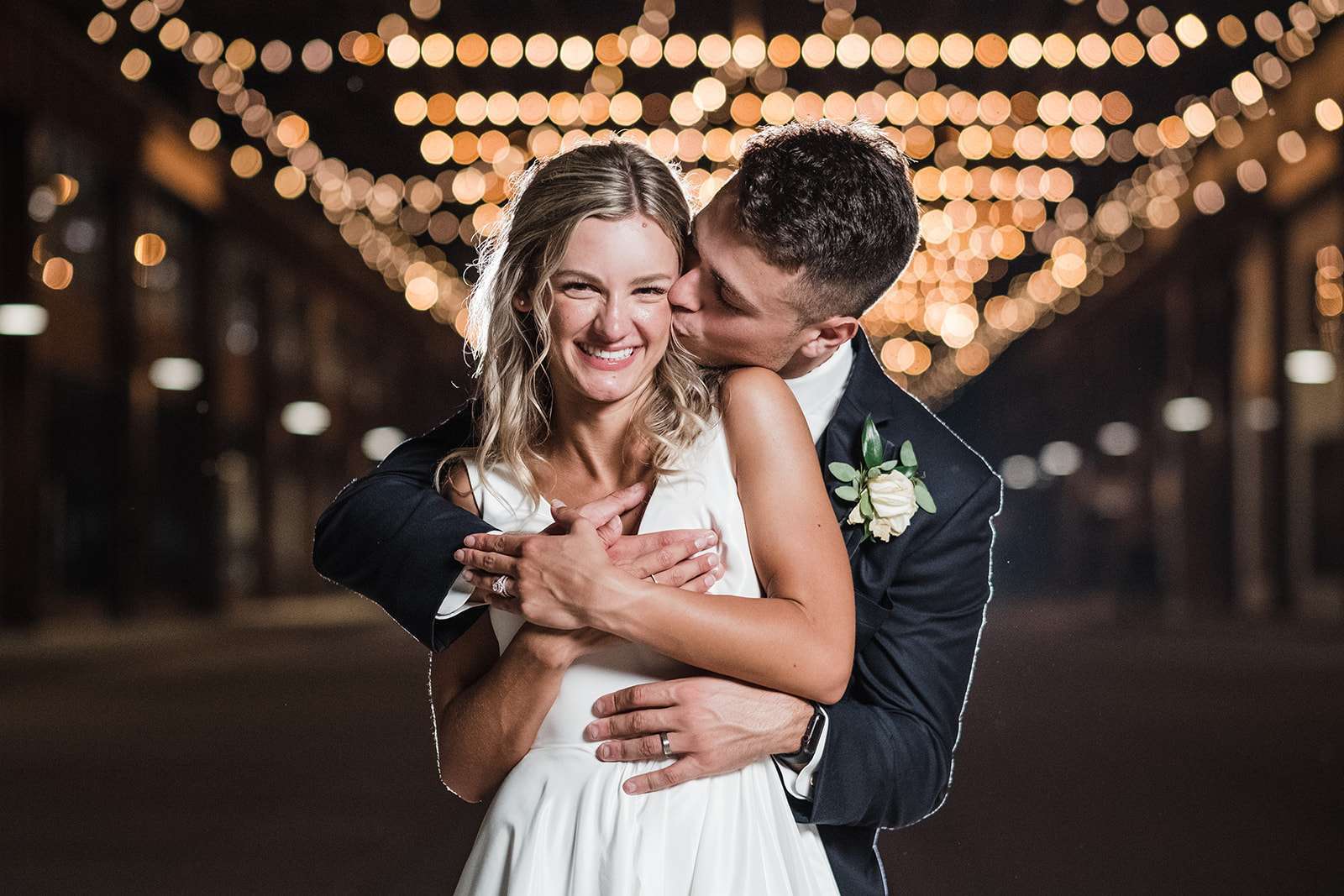 Bride & groom outside the Ironworks Hotel Beloit