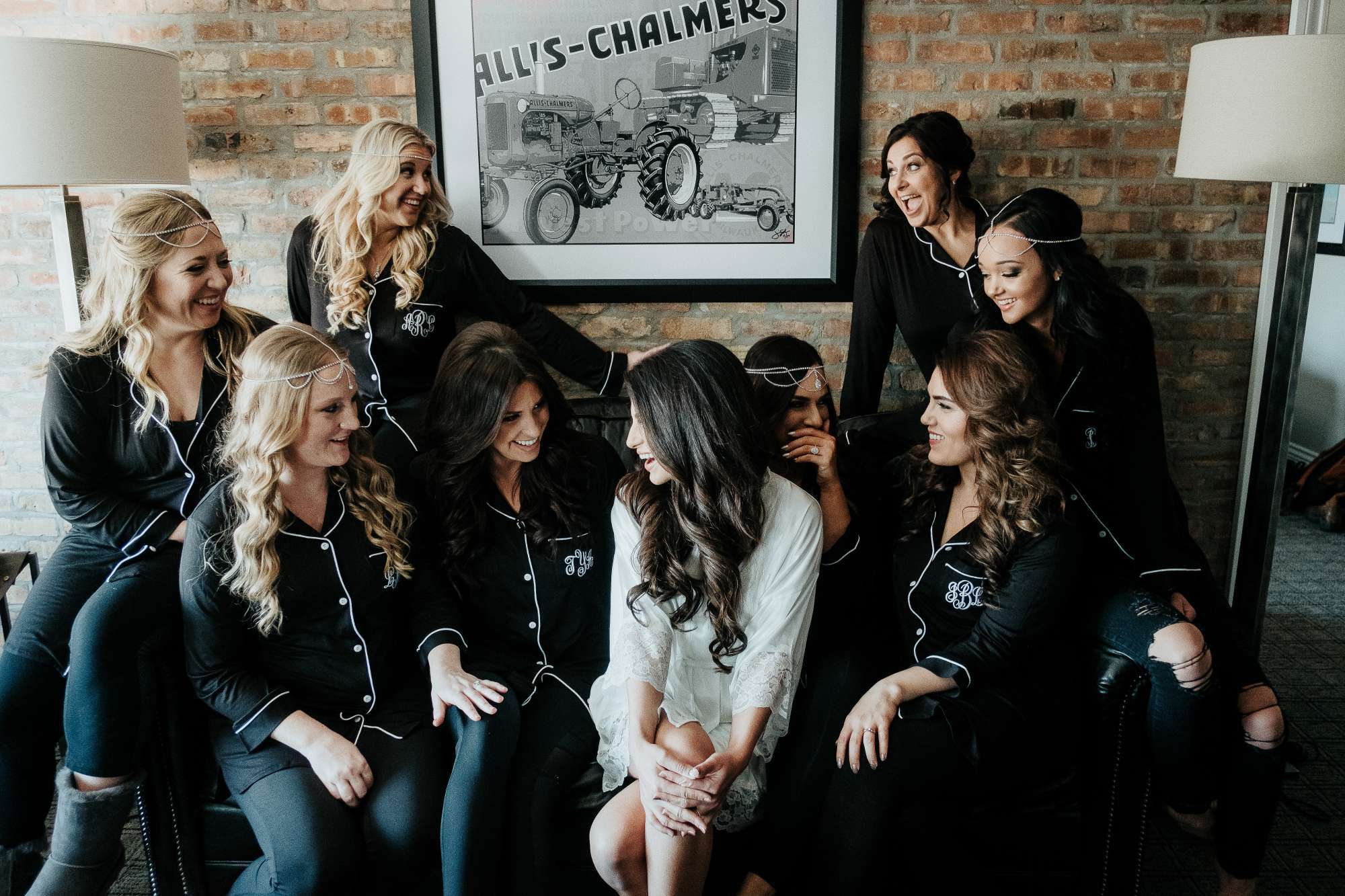 Bride and bridesmaids pose at the Ironworks Hotel Beloit