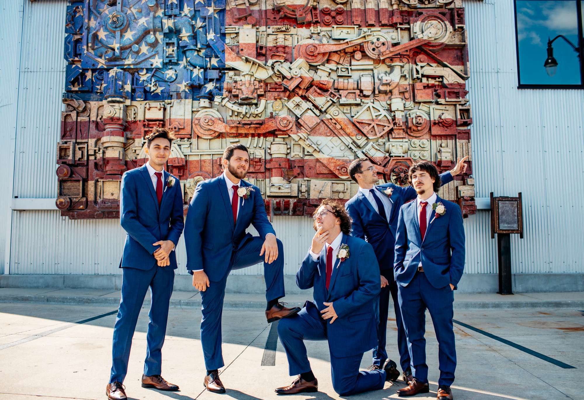 Groomsmen pose outside the Ironworks Hotel Beloit.