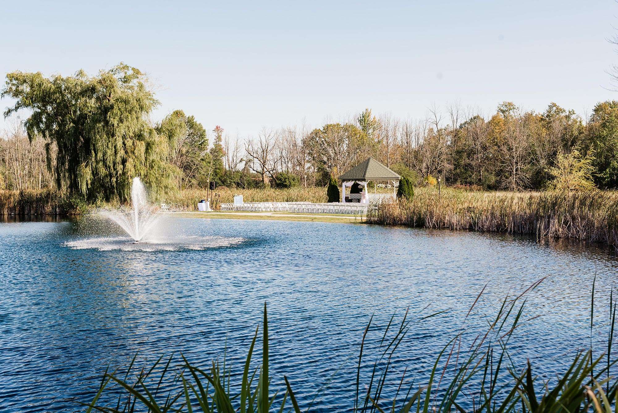 outdoor ceremony space with water/fountain - the florian event venue