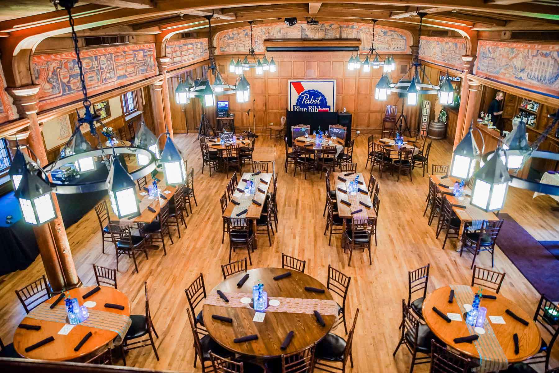 An elegant table setup showcasing the grandeur of the Blue Ribbon Hall at Best Place at Historic Pabst Brewery.