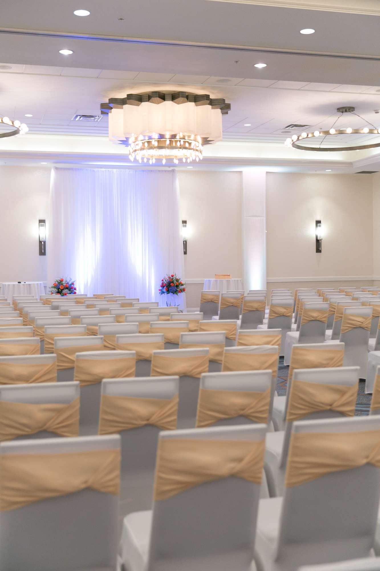 Elegant wedding ceremony in the ballroom at the Milwaukee Marriott Downtown