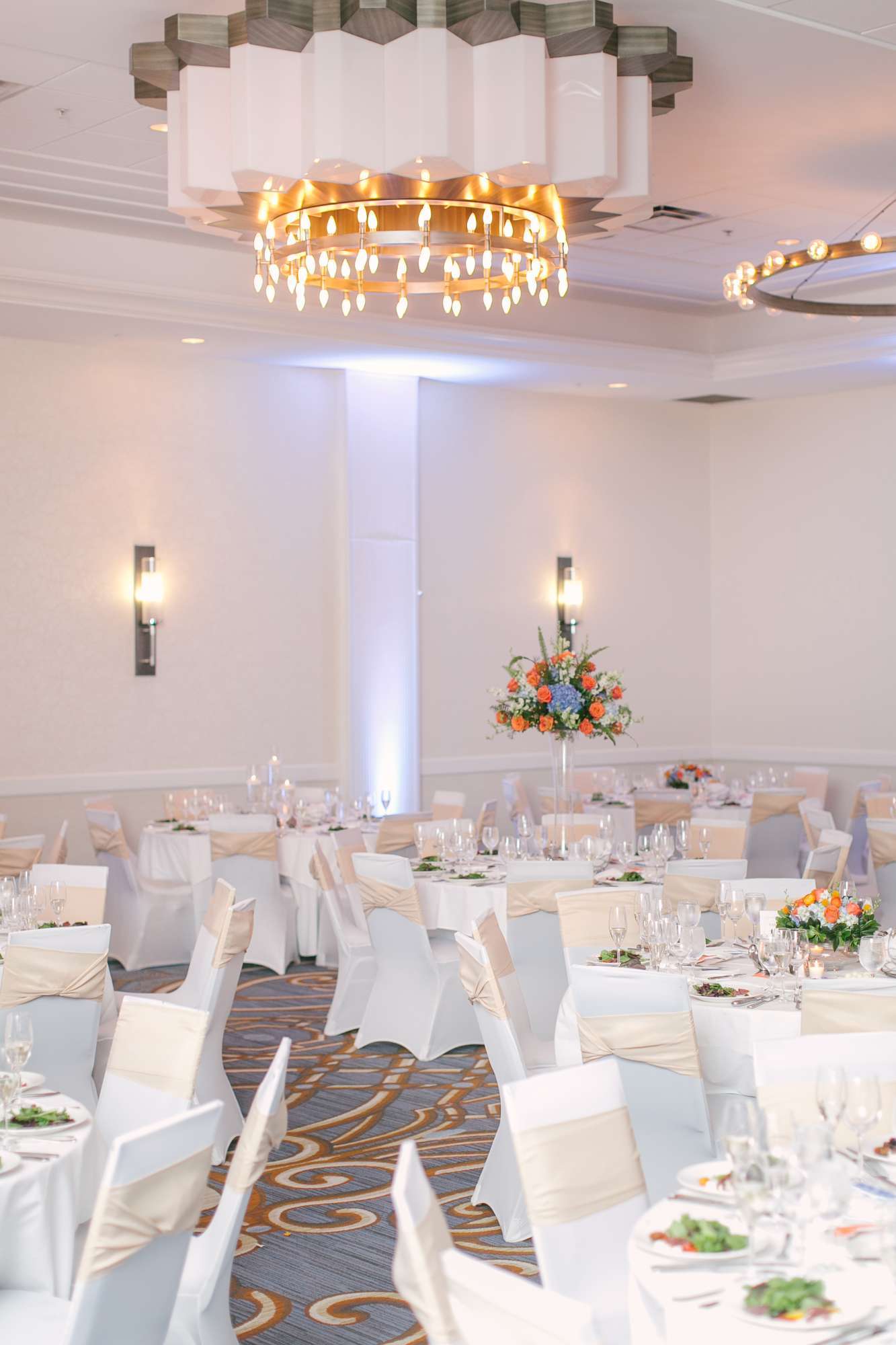 Clean whites and stunning chandeliers in the Milwaukee Marriott Downtown ballroom