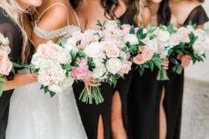 close-up of beautiful bridal party bouquets in shades of pink by Belle Fiori