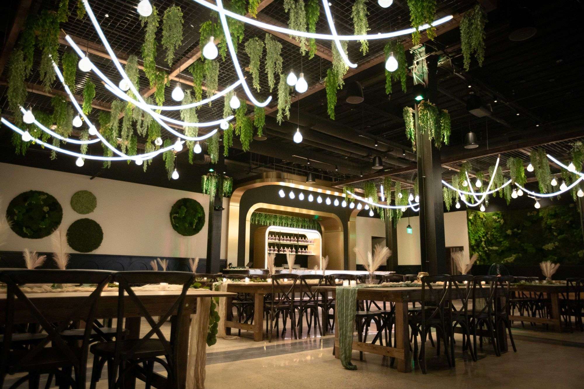 Foliage and lighting create a beautiful setting at Venue 3