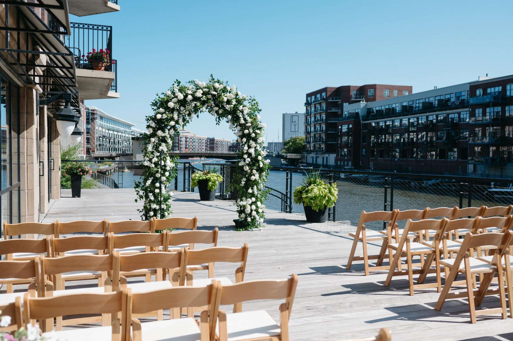 reflections-of-you-floral-ceremony-floral-arch full ceremony arch by Reflections of You on milwaukee river