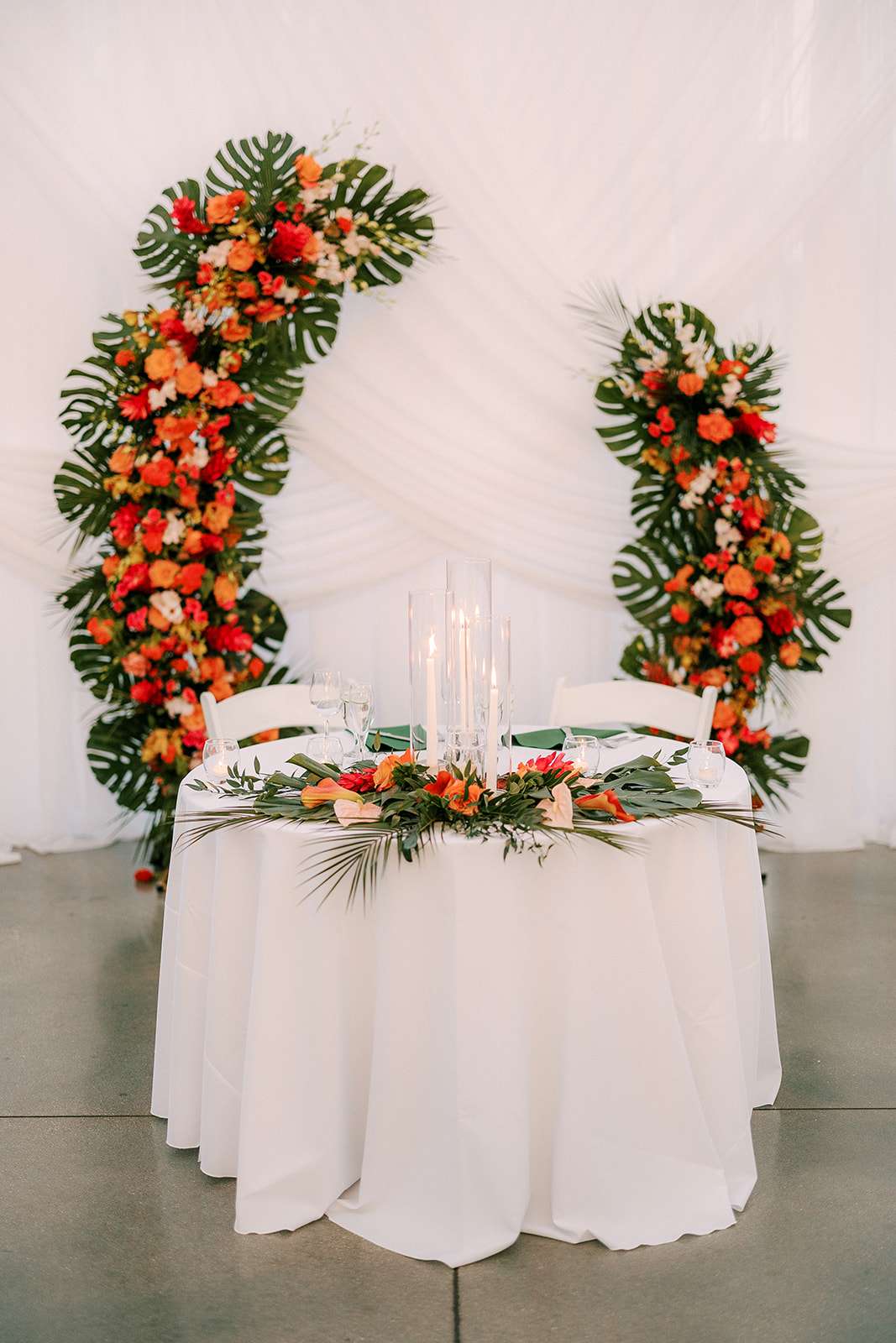 colorful bold floral backdrop for sweetheart table by Reflections of You