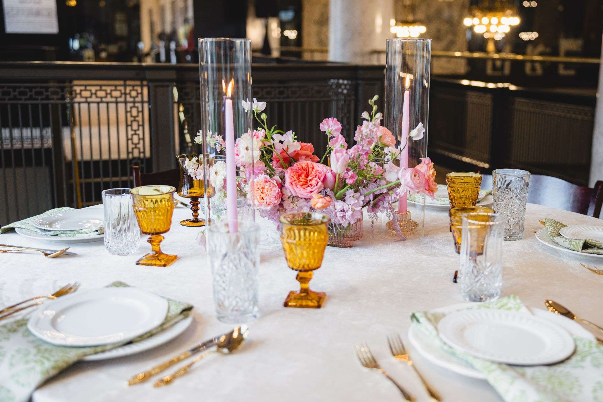 the-journey-mke-table-setting amber glasses and gold silverware place setting designed by The Journey Event Planning