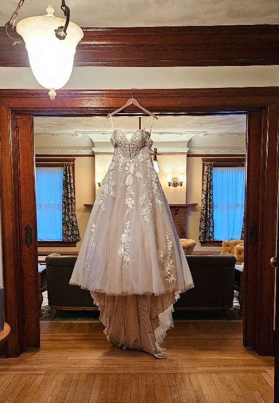 Bridal ballgown with lace at Schwartz Family House in Hartford.