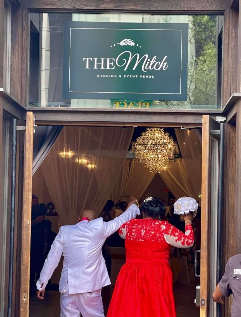 The Mitch’s exterior entrance, offering a sophisticated yet inviting ambiance for weddings and events.