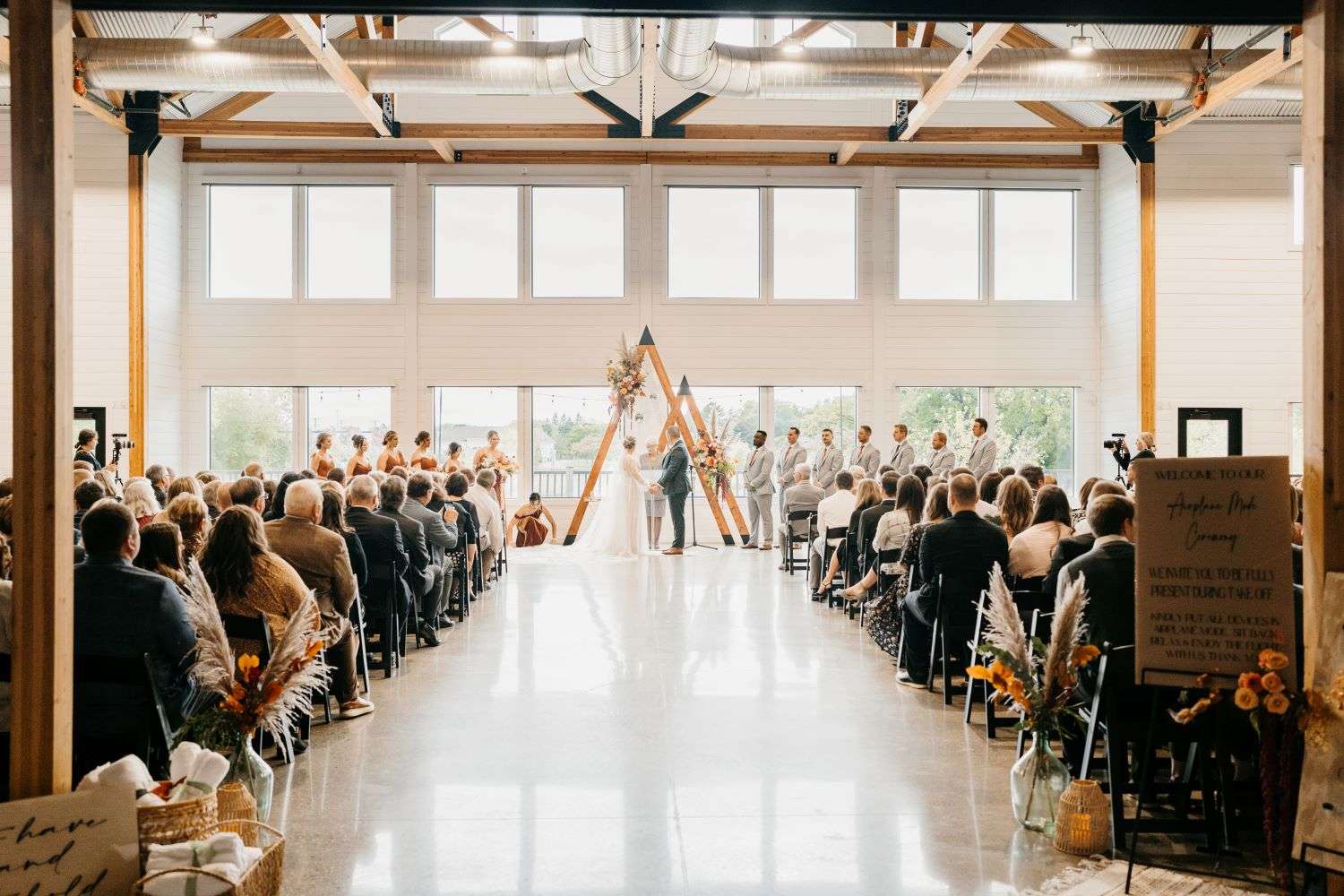 Indoor wedding ceremony at fete in Wales, Wi. Indoor wedding ceremony at fete in Wales, Wi.