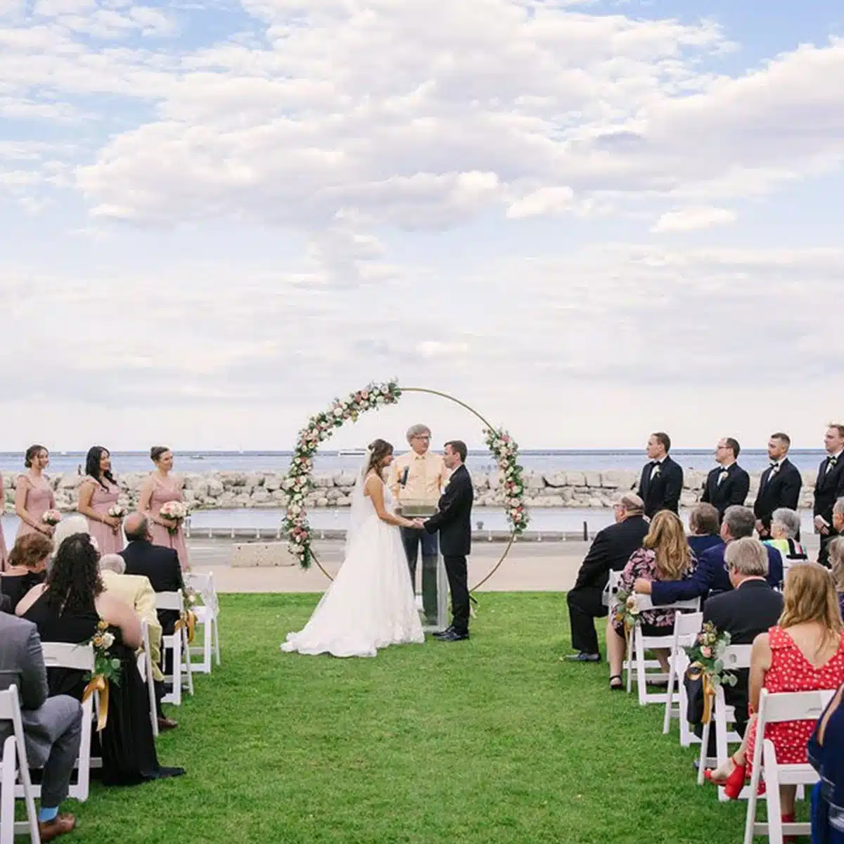 Outdoor wedding ceremony at Discovery World by Bartolottas.