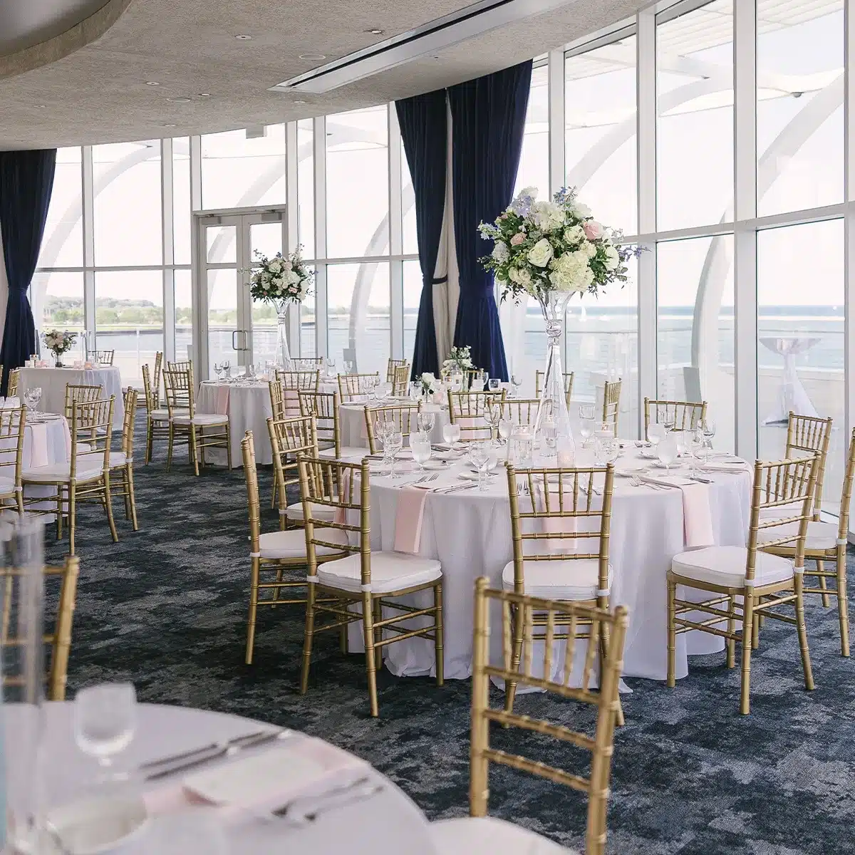 Wedding reception setup at Discovery World in MIlwaukee with classic decor.