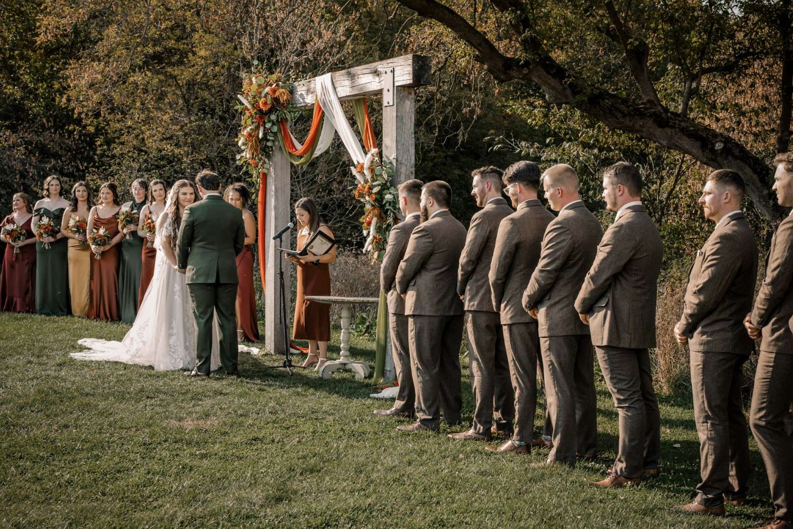 Outdoor wedding ceremony at The Bowery Barn in Wisconsin.