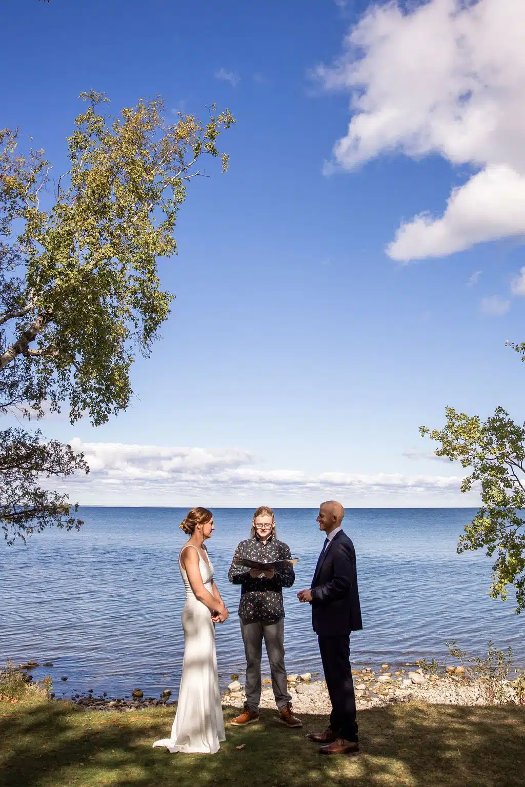 Bride and groom wedding ceremony elopement at Peninsula State Park in Door County. Bride and groom wedding ceremony elopement at Peninsula State Park in Door County.