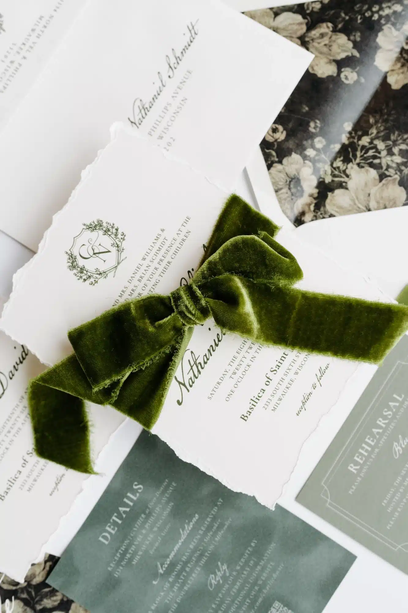 Simple white invitation with romantic details, green velvet ribbon and floral envelope liners. Simple white invitation with romantic details, green velvet ribbon and floral envelope liners.