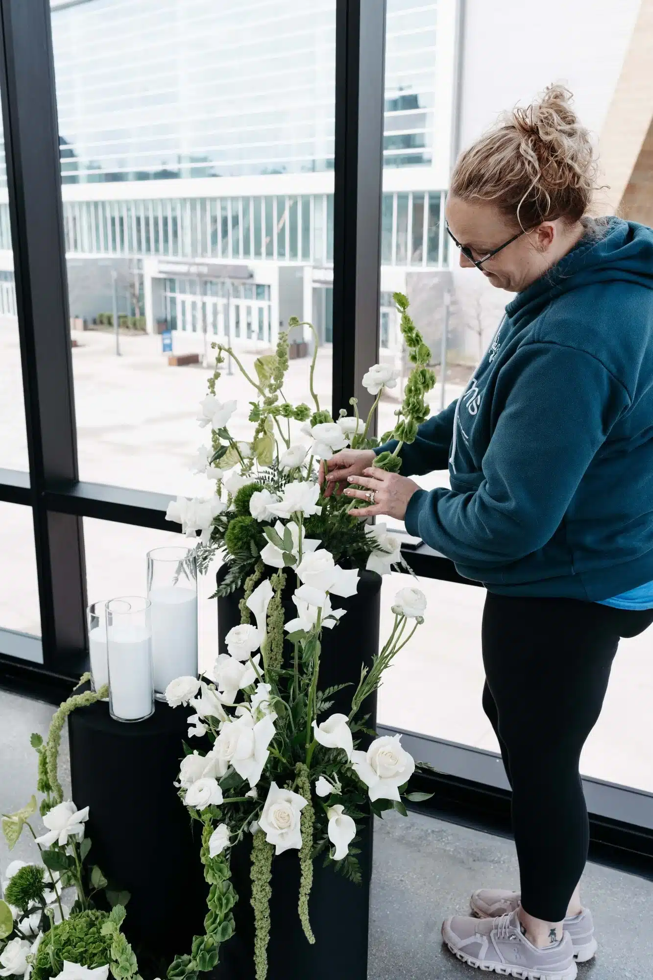 Rachel, owner of Reflections of You, creates floral arrangements at Gather at Deer District. Rachel, owner of Reflections of You, creates floral arrangements at Gather at Deer District.