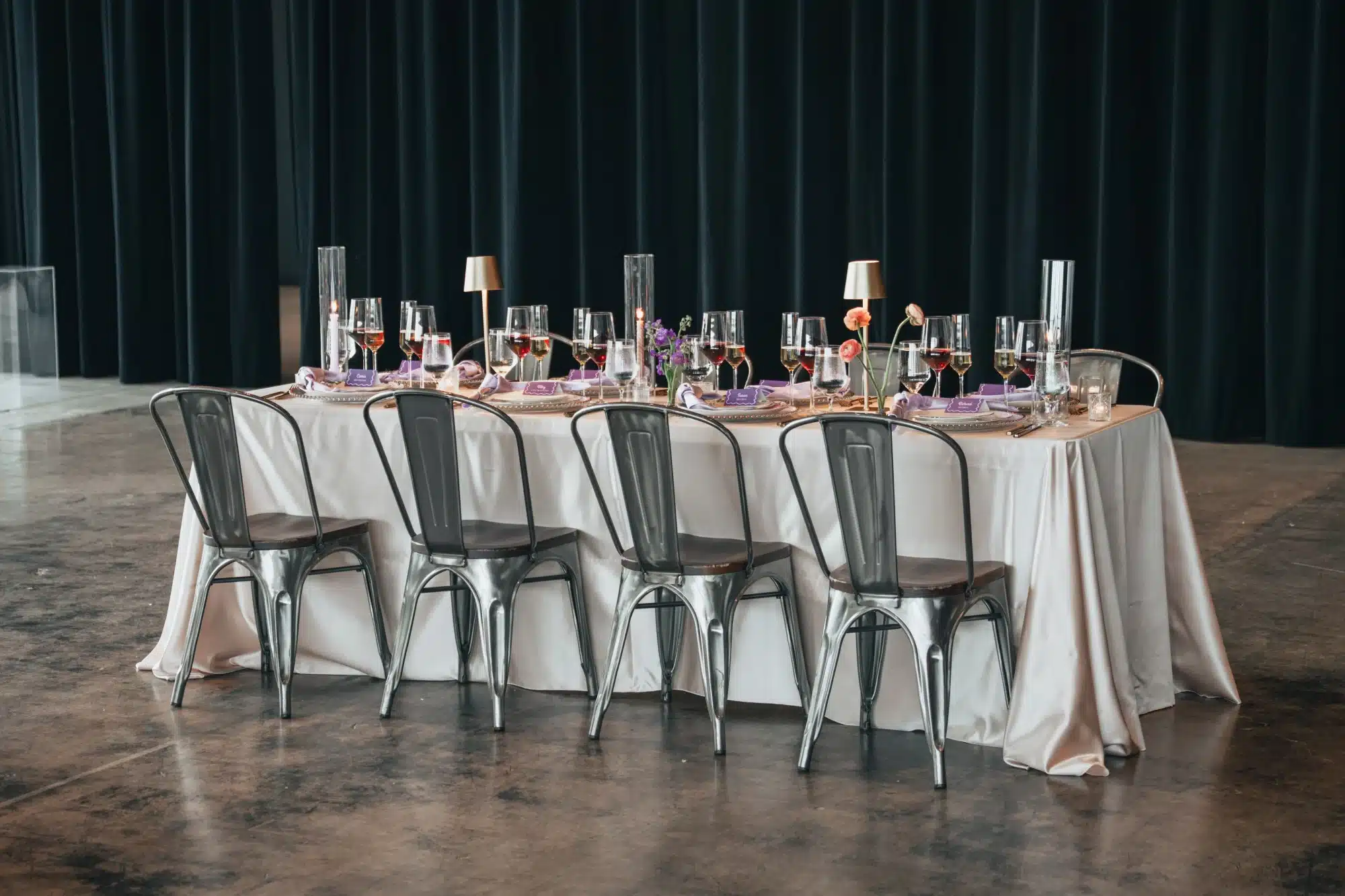 Reception table setup for a purple and coral styled shoot by Celebrait by Kait. Reception table setup for a purple and coral styled shoot by Celebrait by Kait.