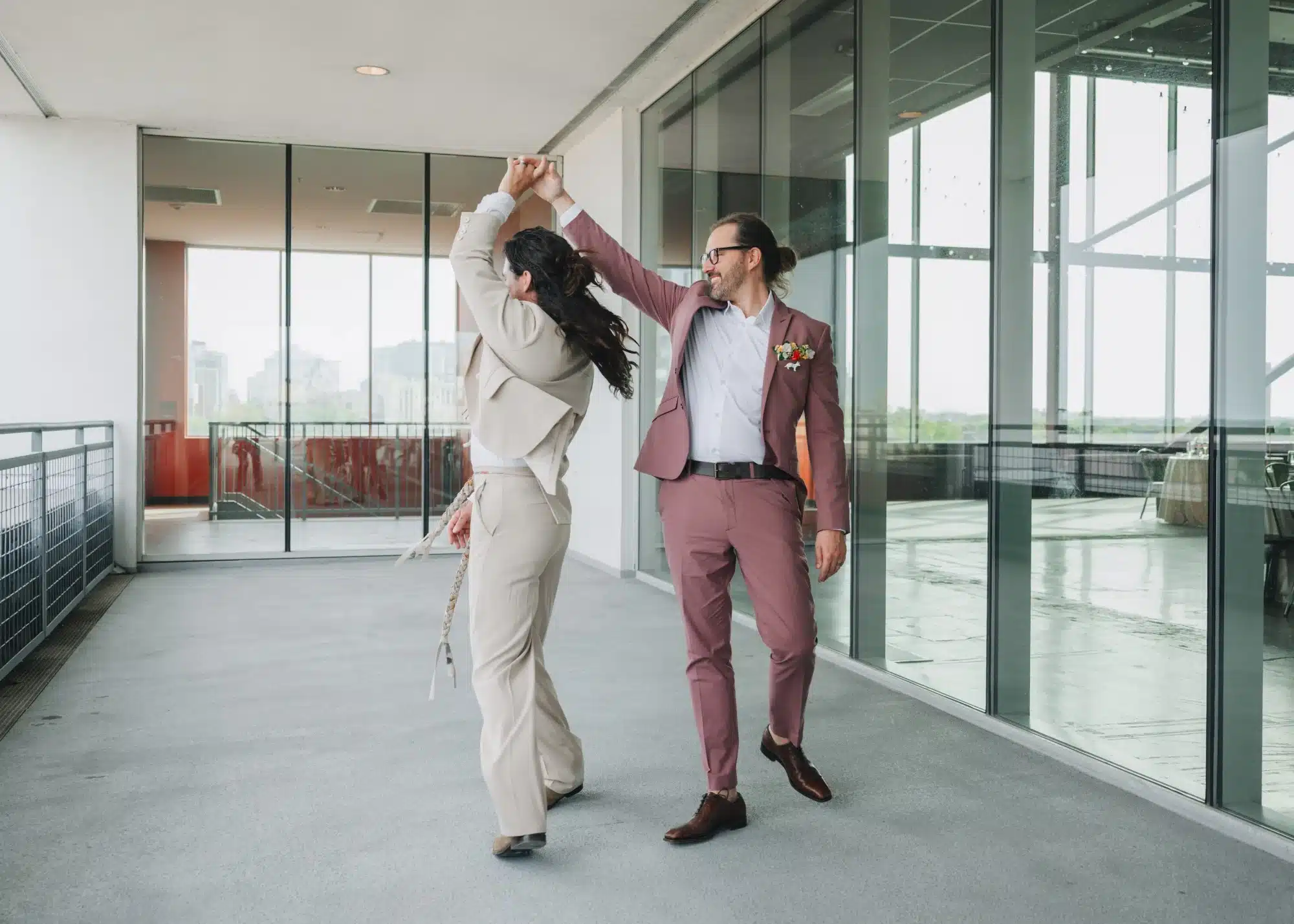 Grooms dancing on the balcony of Jan Serr Studio. Grooms dancing on the balcony of Jan Serr Studio.