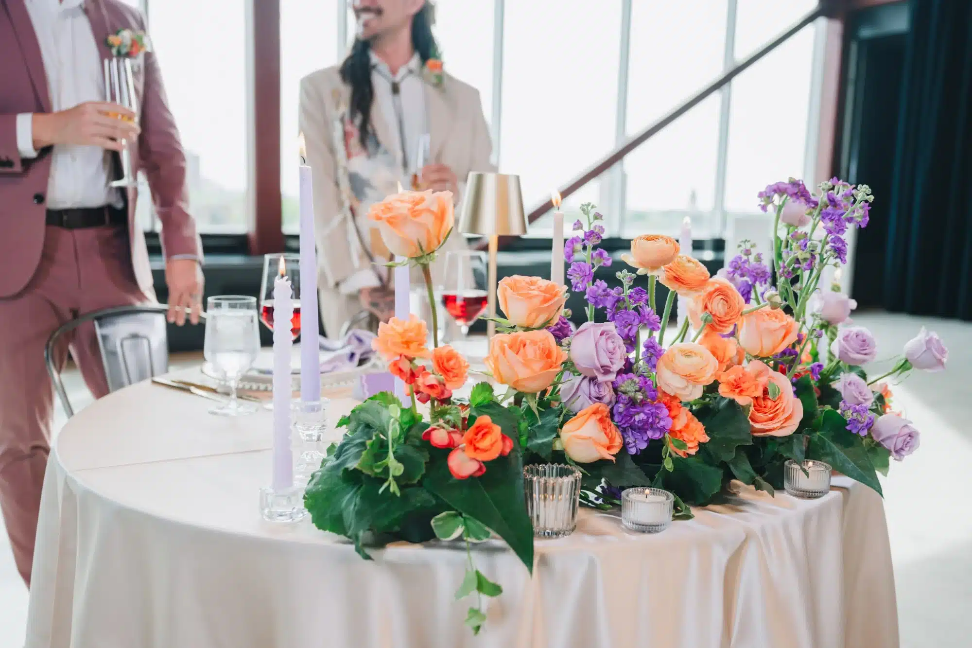 Colorful tabletop floral arrangement from Vines and violet in Milwaukee. Colorful tabletop floral arrangement from Vines and violet in Milwaukee.