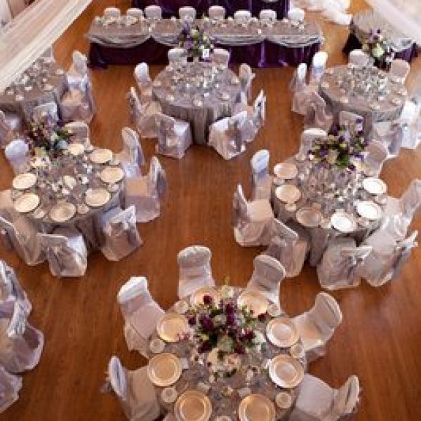 Image taken from above overlooking nicely decorated wedding reception area.