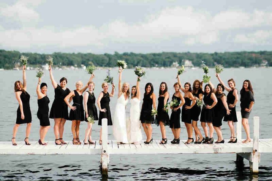 Large Bridemaids and brides on deck at lake lawn resort