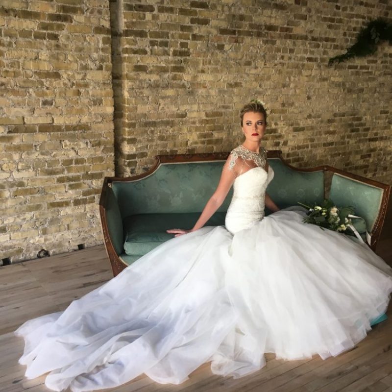 Bride on settee for beautiful setting and photo opportunity