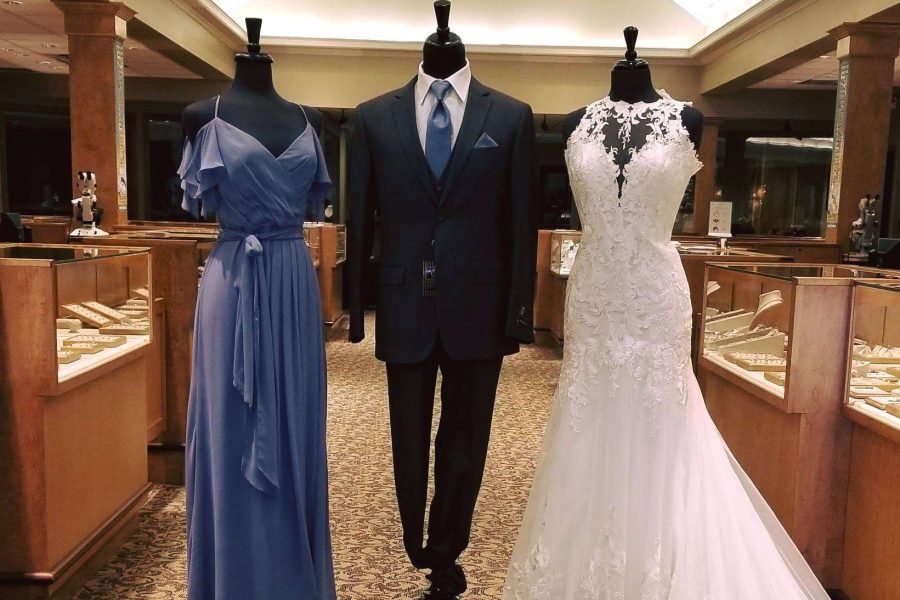 Inside store with Bride dress, Groomswear and Bridesmaid dress set up