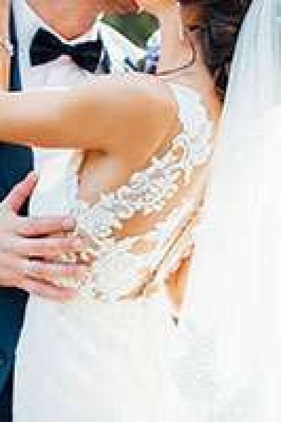 Wedding Couple showing back of gown and view