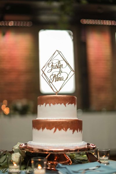 Gold adds the perfect touch to this wedding cake by Sweet Perfections Bakery in Waukesha, WI